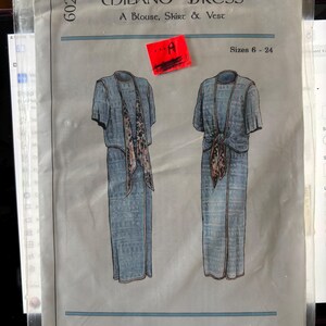 May include: A vintage sewing pattern for a Milano dress, including a blouse, skirt, and vest. The pattern features illustrations of the dress design in light blue, with sizes ranging from 6 to 24. The pattern is from Dos de Tejas Patterns.