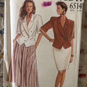 May include: A vintage New Look sewing pattern envelope featuring illustrations of two women in double-breasted blazers and skirts. The envelope is white with the text "NEW LOOK" and the pattern number "6514". Size range 6-18.