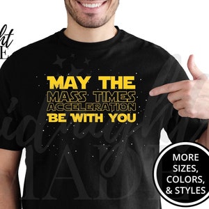 May include: Black t-shirt with a yellow graphic that reads "May the mass times acceleration be with you".