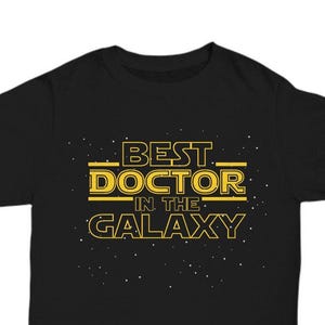 Doctor Shirt Gift, Best Doctor in the Galaxy Funny Doctor T Shirt Tee, MD Medical School Doctor Graduation New Job Promotion Retirement Gift