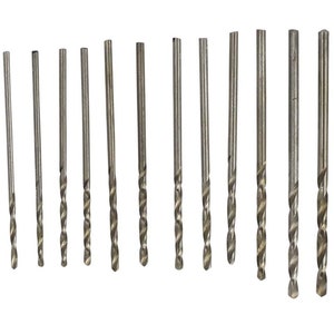 May include: A collection of silver drill bits of different sizes, displayed in a line against a white backdrop. Each bit features a spiral flute design for effective drilling. The bits are made of metal and are designed for use with a drill.