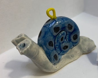 Ornamento de caracol desacelere: Aloysius