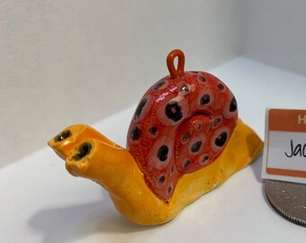 Ornamento de caracol desacelere: Jackson