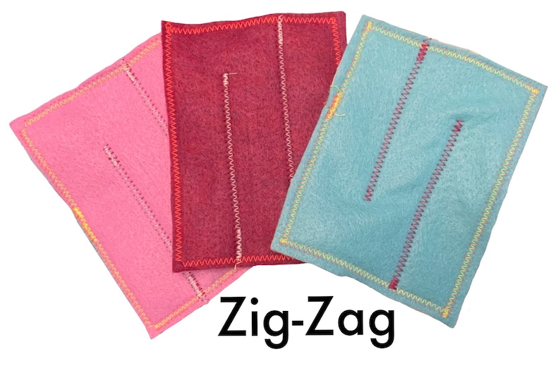May include: Three felt squares with zig-zag stitching around the edges. The squares are pink, red, and blue. The text "Zig-Zag" is printed below the squares.