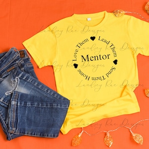 May include: Yellow short-sleeved t-shirt with a black circle design that says "Love Them, Lead Them, Mentor, Send Them Home".