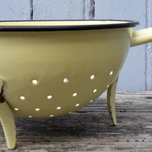 yellow enamelled colander