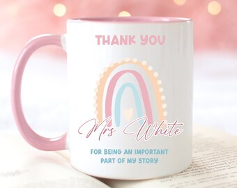 May include: White ceramic mug with a pink rim and handle. The mug has a rainbow design with the text "Thank You" and "Mrs. White" and the phrase "For being an important part of my story".
