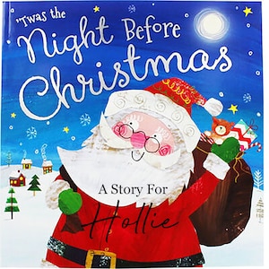May include: A children's book cover with the title "'Twas the Night Before Christmas" in white script against a blue night sky with a full moon and stars. Santa Claus is featured, holding a sack of gifts. The text "A Story For Hollie" is also present.