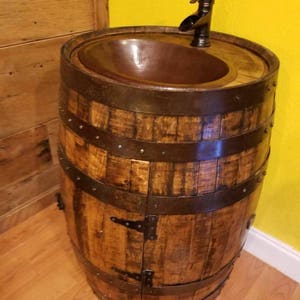 Rustic Whiskey Barrel Vanity with Hammered Copper Sink and Oil Rubbed Bronze Waterfall Faucet