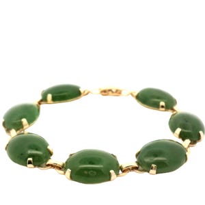 Jade Bracelet In 14k Yellow Gold.