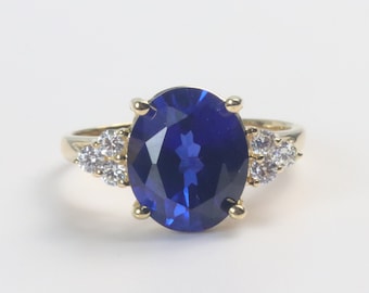 Synthetic Sapphire Diamond CZ Ring in 14k Yellow Gold ( 5 carat)