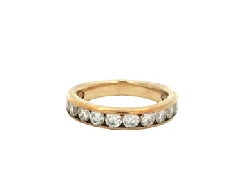 Alianza de boda con diamantes en oro amarillo de 10 k.