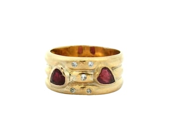 Anello vintage con rubini e diamanti in oro giallo 18k