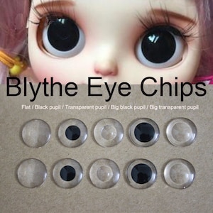 May include: A set of ten Blythe doll eye chips in various styles. The eye chips are clear plastic with black pupils. The eye chips are arranged in two rows of five. The text "Blythe Eye Chips" is printed above the eye chips. The text "Flat / Black pupil / Transparent pupil / Big black pupil / Big transparent pupil" is printed below the eye chips.