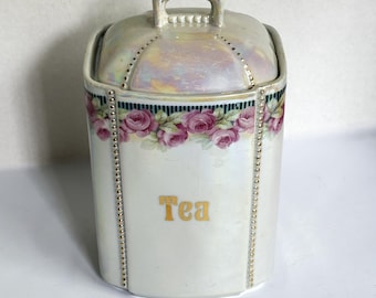 Bote para té Lusterware iridiscente, fabricado en Alemania, con rosas, puntos en relieve y detalles dorados.