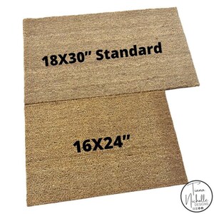 May include: Two brown coir doormats, one is 18x30 inches and labelled "Standard", the other is 16x24 inches.