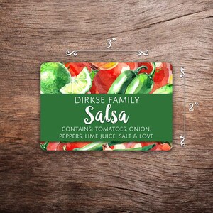 May include: A green and white label with the text "DIRKSE FAMILY Salsa CONTAINS: TOMATOES, ONION, PEPPERS, LIME JUICE, SALT & LOVE" printed on it. The label has a watercolor background of tomatoes, limes, and green peppers.