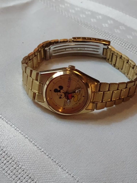 Seiko 1980s Gold Disney Mickey Mouse Starburst Watch - Etsy display picture 1