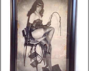 Aged reproduction print of Bettie Page The Queen of Pinups A4 size