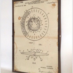 Aged reproduction print of patent plans for a rotating flying disc - Art Print A4 size.