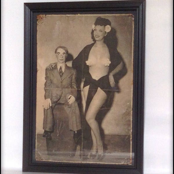 Unusual aged reproduction print of a vintage glamour girl with a ventriloquist's dummy - A4 size.