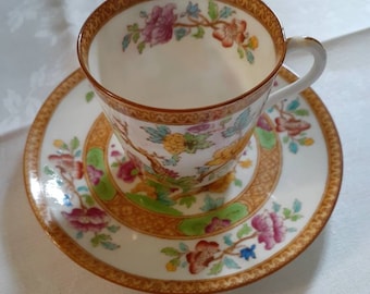 Demitasse antique Asian motif cup and saucer