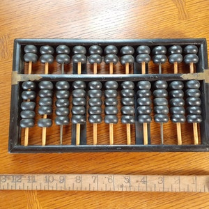 Vintage Abacus, Lotus Flower Brand, Peoples Republic of China (ebonized wood, bamboo and brass) Excellent condition.