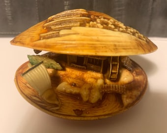 Vintage Japanese Carved Celluloid Clam Shell Diorama featuring a Bivalue water wheel inside