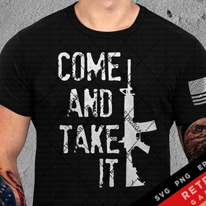 May include: Black t-shirt with white text that reads "Come and Take It" with a silhouette of a rifle. The shirt has a distressed look and a small American flag on the right sleeve.