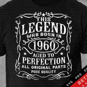 May include: Black and white graphic design on a black t-shirt. The design features a vintage-style label with the text "This Legend Was Born In 1960 Aged To Perfection All Original Parts Pure Quality".