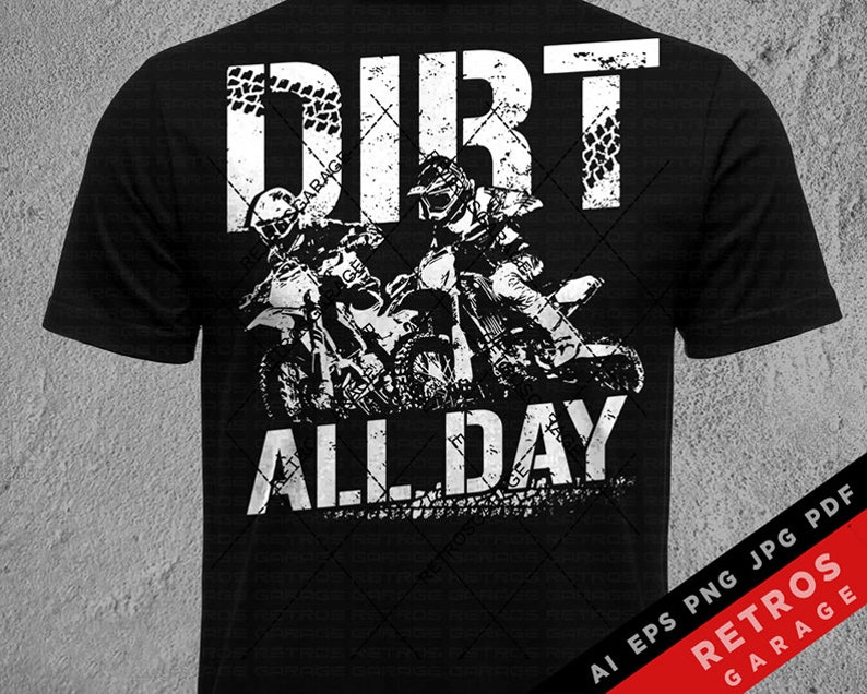 May include: Black t-shirt with a white graphic of two dirt bike riders and the text "Dirt All Day".
