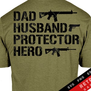 May include: Green t-shirt with black text that reads "Dad Husband Protector Hero" with images of guns. The text has a distressed look. The bottom right corner of the image has a red, white, and black logo that reads "Retros Garage" with the text "SVG PNG EPS AI" above it.