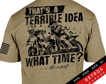 May include: A black and white graphic design on a brown t-shirt featuring two dirt bike riders with the text "That's a terrible idea. What time?" and "Retros Garage" in the bottom right corner.