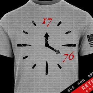 May include: A gray t-shirt with a clock face design featuring bullets as the hour markers. The clock face reads "17" and "76" in red. The background of the shirt is covered with the text "RETROS GARAGE" repeated in a gray pattern. The shirt also features a small American flag in the upper right corner. The text "SVG PNG EPS AI RETROS GARAGE" is in the lower right corner.
