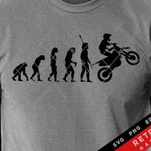 May include: A black and white silhouette design of the evolution of man, ending with a man riding a dirt bike. The design is on a gray t-shirt.