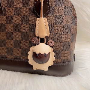 Louis Vuitton Dog Bag Charm and Key Holder Monogram Brown in Calf