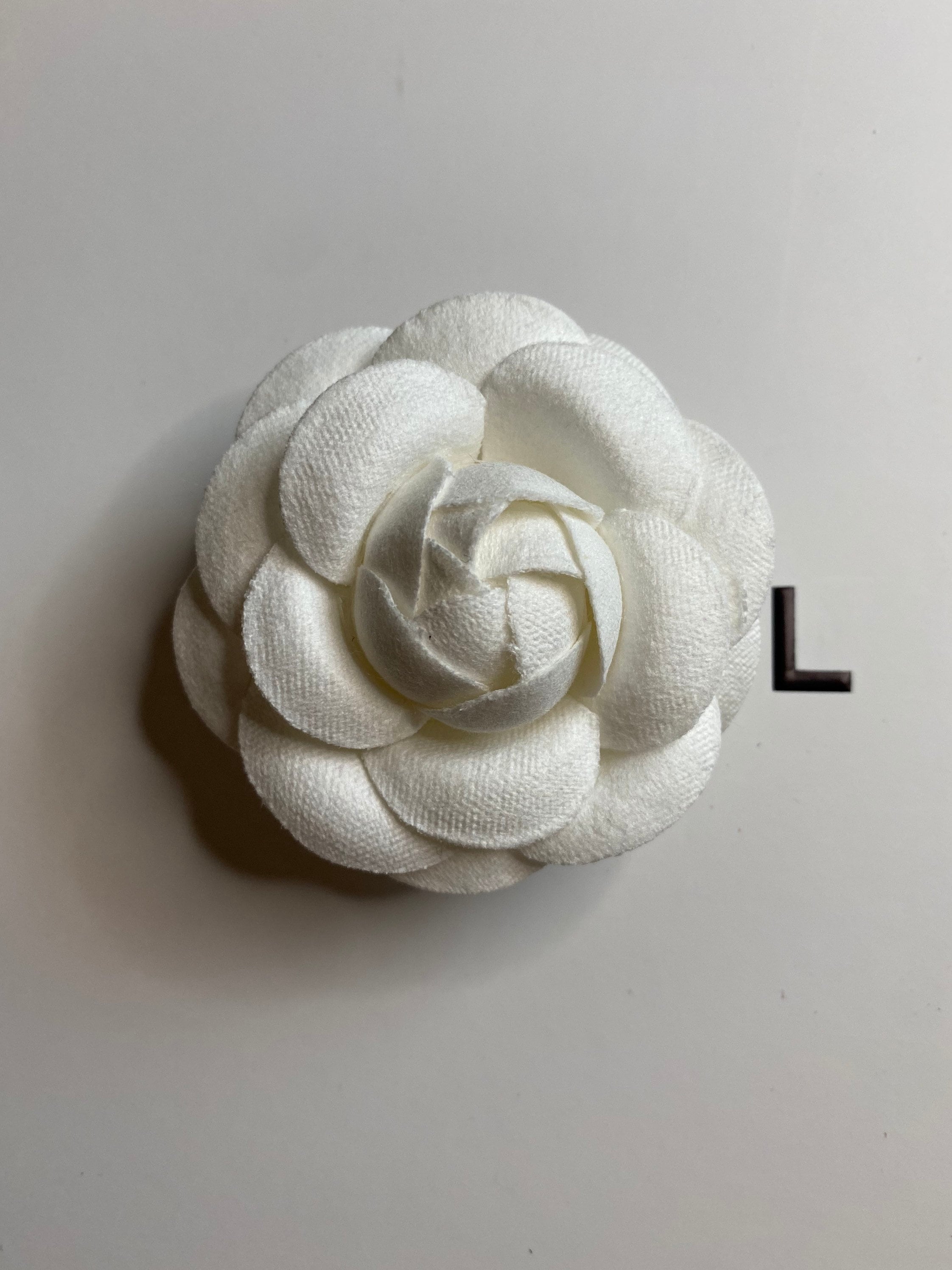 chanel flower pin