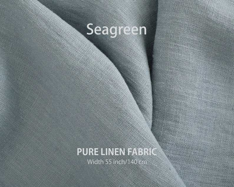 Close-up of seagreen premium organic linen fabric, displaying the fine texture and weave of high-quality European flax material sold by the yard.
