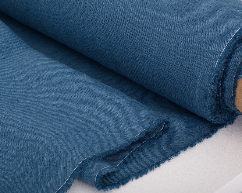 A roll of Denim Blue pure linen fabric