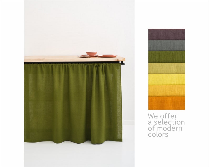 Moss green stone washed linen privacy curtain displayed with a wooden shelf and a color swatch palette.