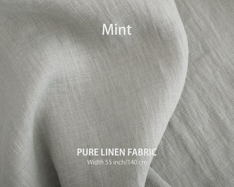 Mint-colored pure linen fabric, showcasing the soft texture and high-quality European woven flax, available for purchase by the yard.