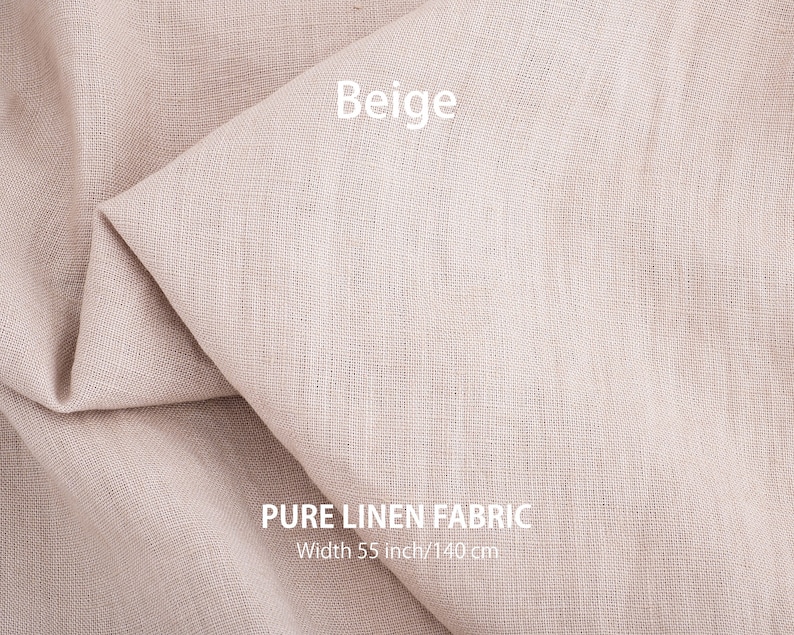 Folded beige organic linen fabric, available by the yard, highlighting the high-quality and premium European weave.