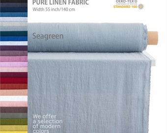 May include: A roll of seagreen pure linen fabric, 55 inches wide, with the Oeko-Tex Standard 100 certification label. The fabric is displayed on a white surface with a wooden dowel.