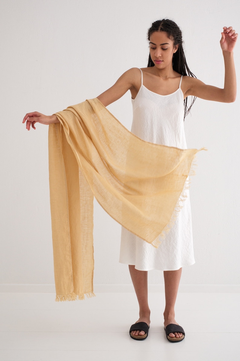 Natural colors and soft washed linen make this linen shawl a versatile accessory for any season.