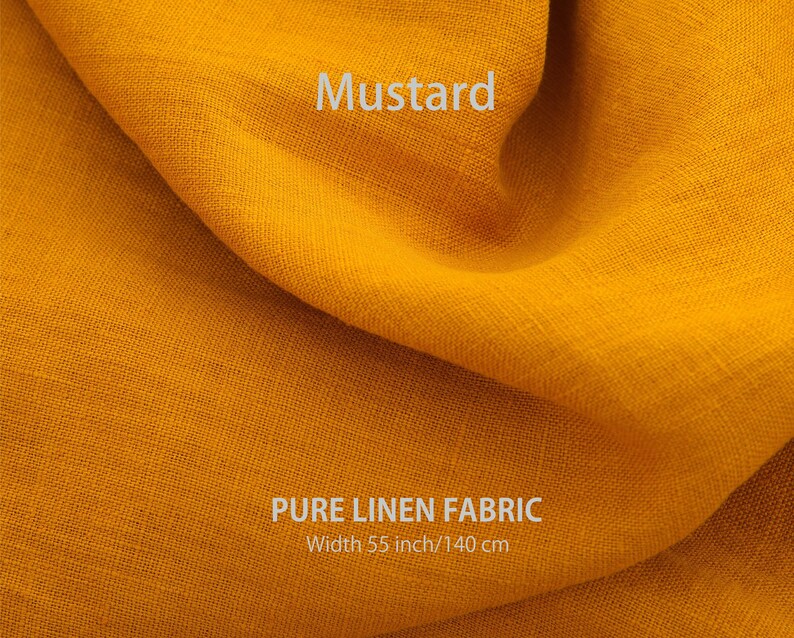 "Close-up of premium mustard pure linen fabric by the yard, showcasing the fine texture and natural color of high-quality European flax textiles, available from a specialized washed linen fabric store."