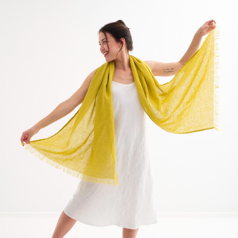 Lightweight and breathable, this linen scarf in natural colors is made from soft washed linen.