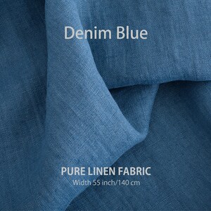 Folded denim blue pure linen fabric by the yard, exemplifying premium European quality best flax textiles, from a linen fabric store in natural colors.