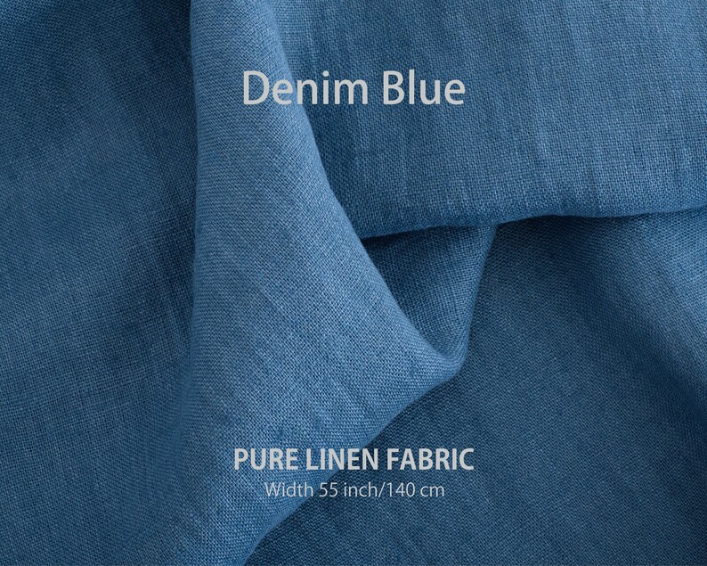 Folded denim blue pure linen fabric by the yard, exemplifying premium European quality best flax textiles, from a linen fabric store in natural colors.