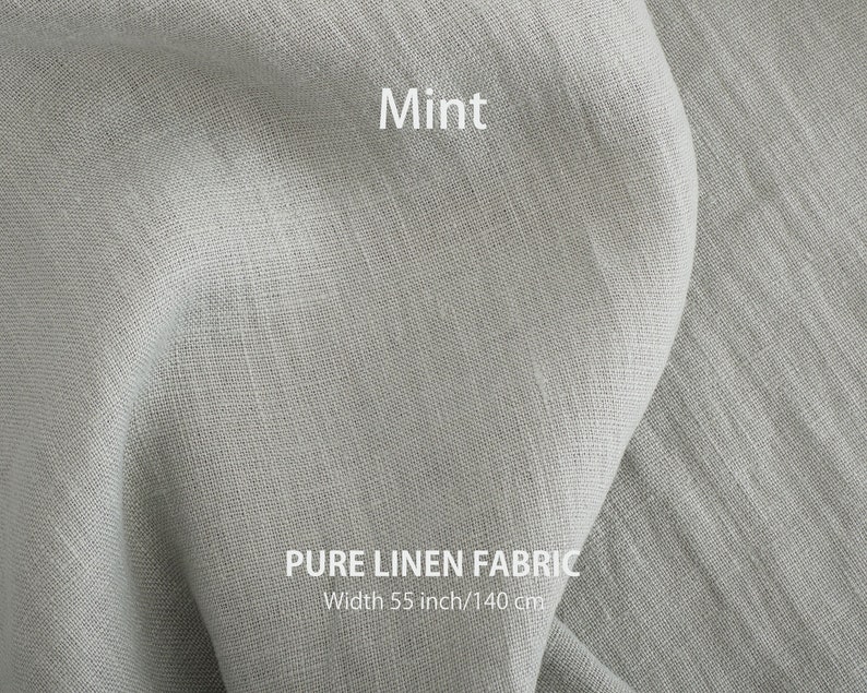 A textured mint green pure linen fabric draped elegantly, with "Mint" and "PURE LINEN FABRIC, Width 55 inch/140 cm" text showcasing its color and size.