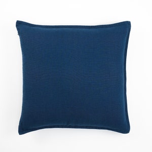 Dark blue linen pillow cover displayed against a white background.